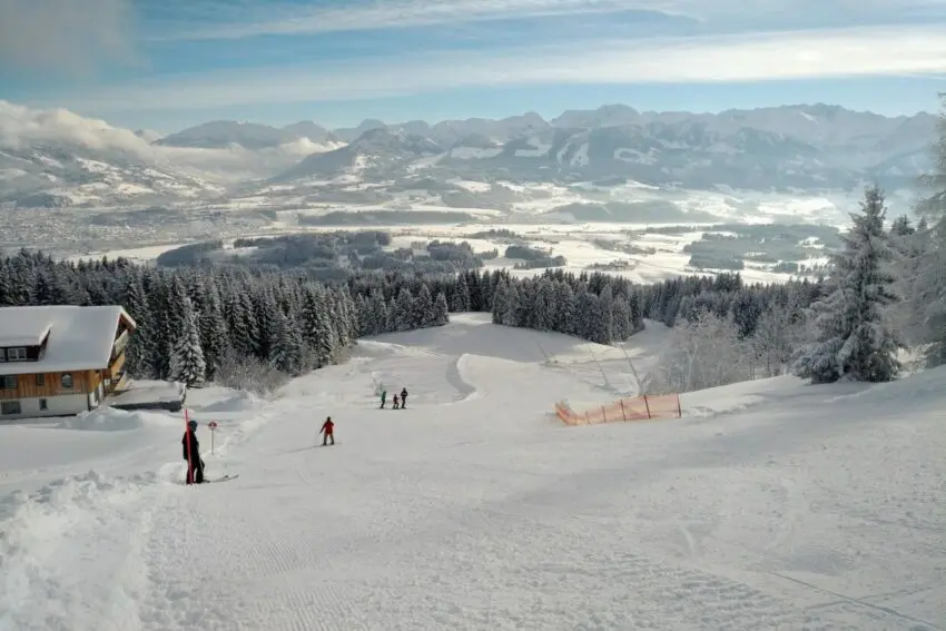 people walking on snow covered field during daytime